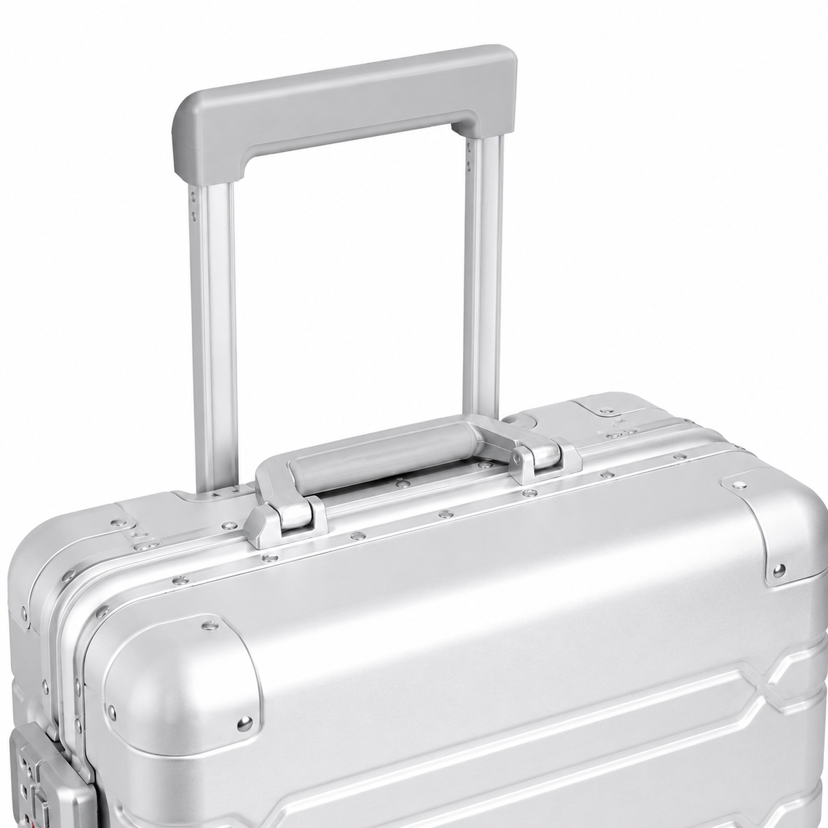 Haut de la valise Orvessa Vendôme argent : poignée télescopique, poignée supérieure et coins rivetés